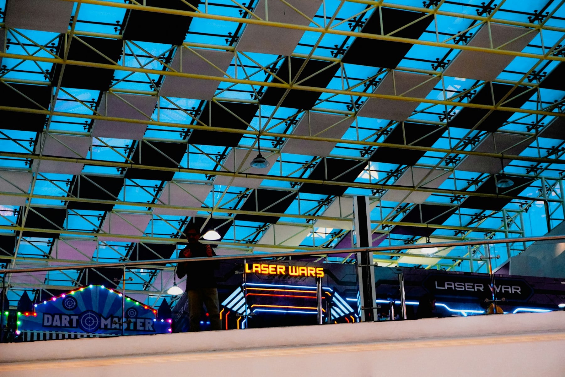 A neon-lit games hall